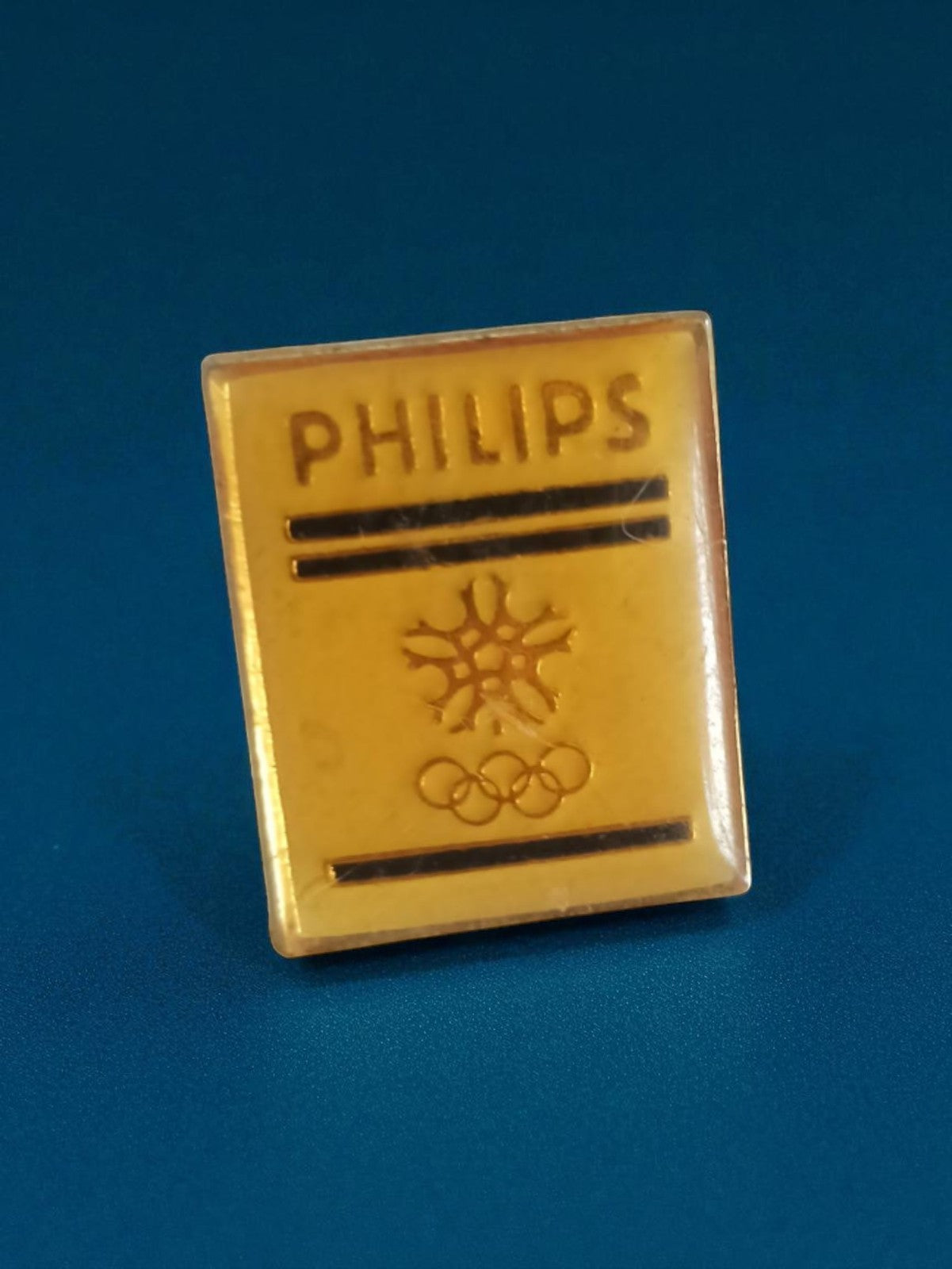 Pin's ancien Philips Jeux Olympiques badge rétro vintage publicité