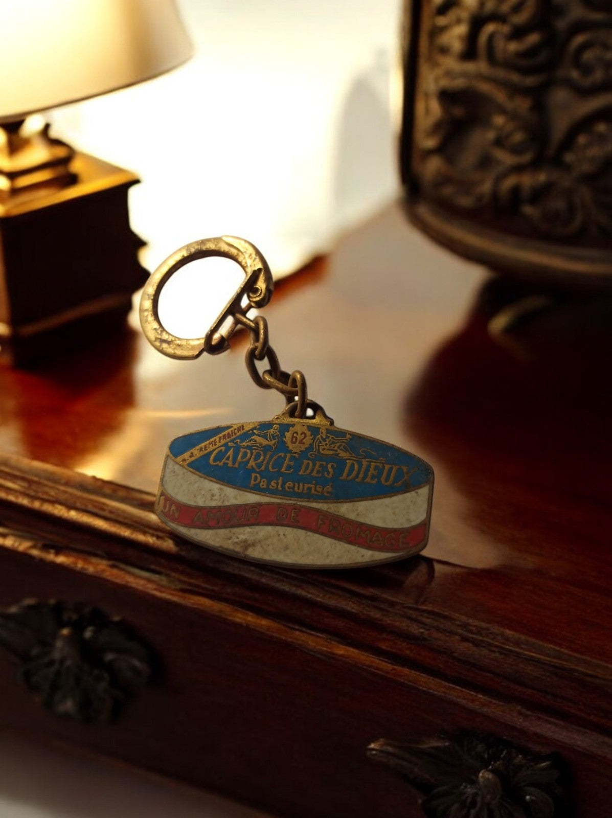 Porte-clés vintage Caprice des Dieux publicitaire ancien fromage