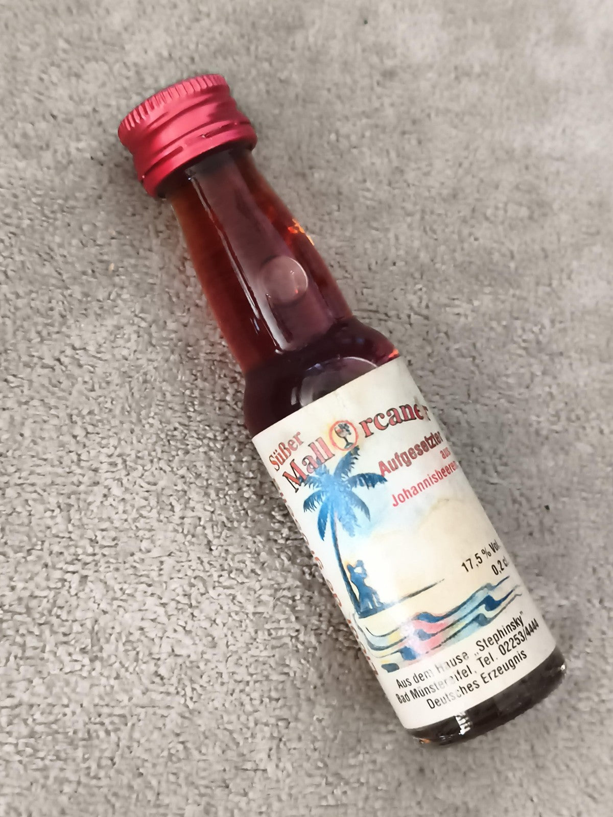 Miniature alcool Mallorcane 0,2L partiellement remplie bouchon rouge