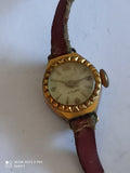 Montre femme Hallaud mécanique vintage dorée 17 rubis cadran relief