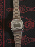 Montre vintage LCD quartz homme Taurus rétro années 80 bracelet métal