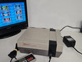 Console Nintendo NES dézonnée avec jeu Megaman 3 ? Fonctionne ? TV non incluse