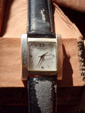 Montre homme vintage Norwich Union quartz cadran carré, bracelet noir usé