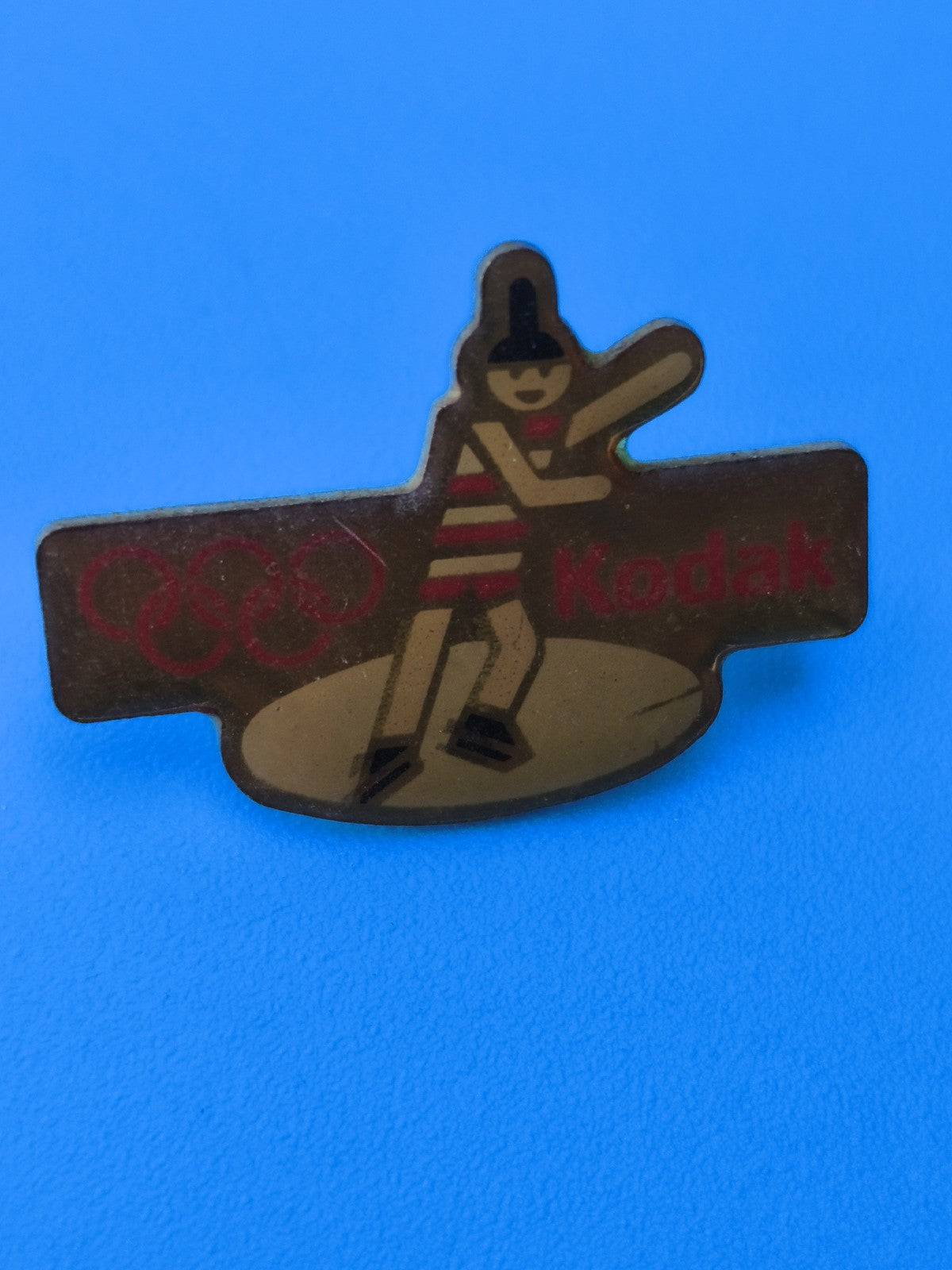Pin's vintage Kodak Jeux Olympiques mascotte, collection sport rétro