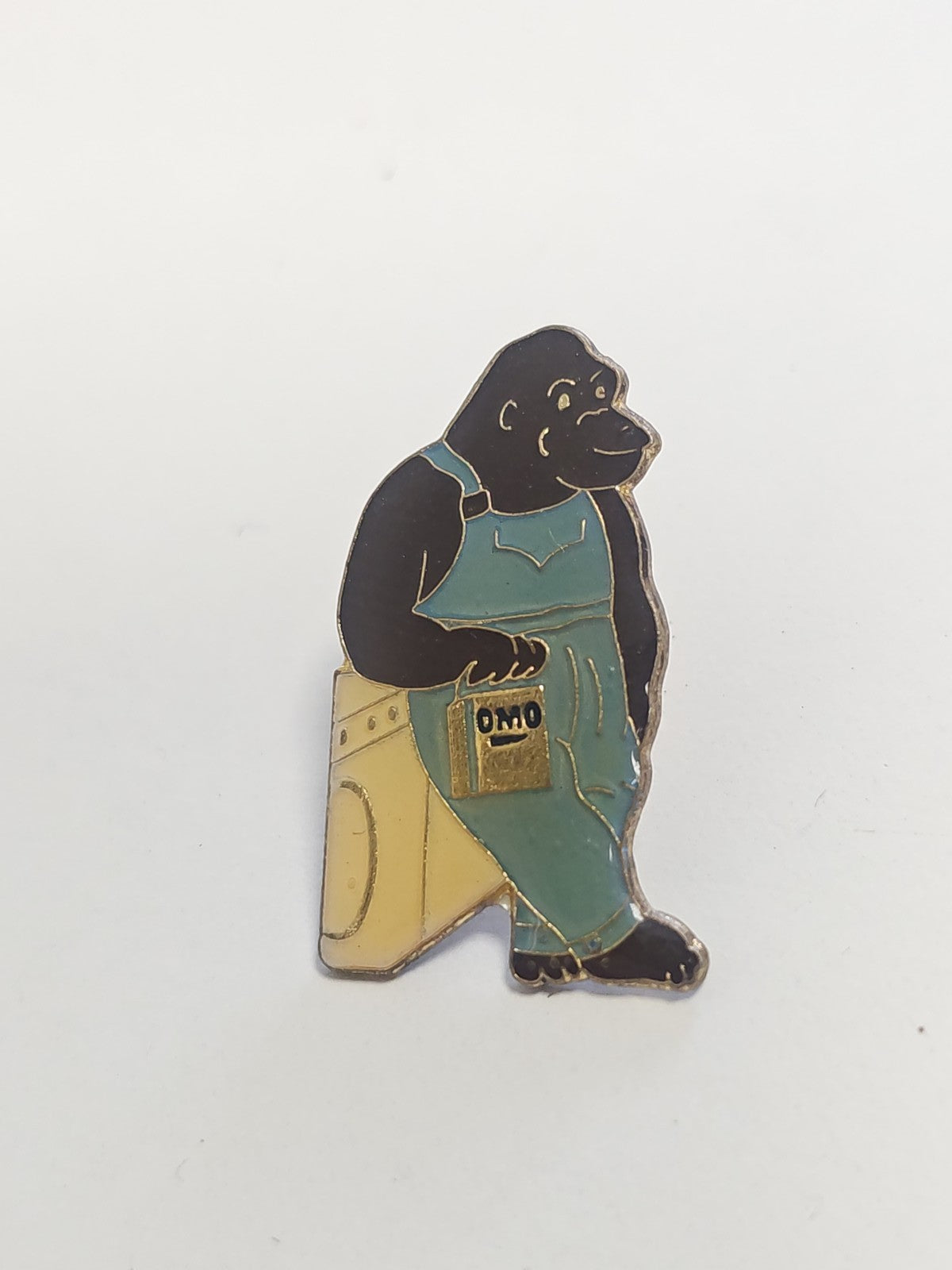 Pin's ancien publicitaire OMO lessive rétro, badge collection vintage années 80-