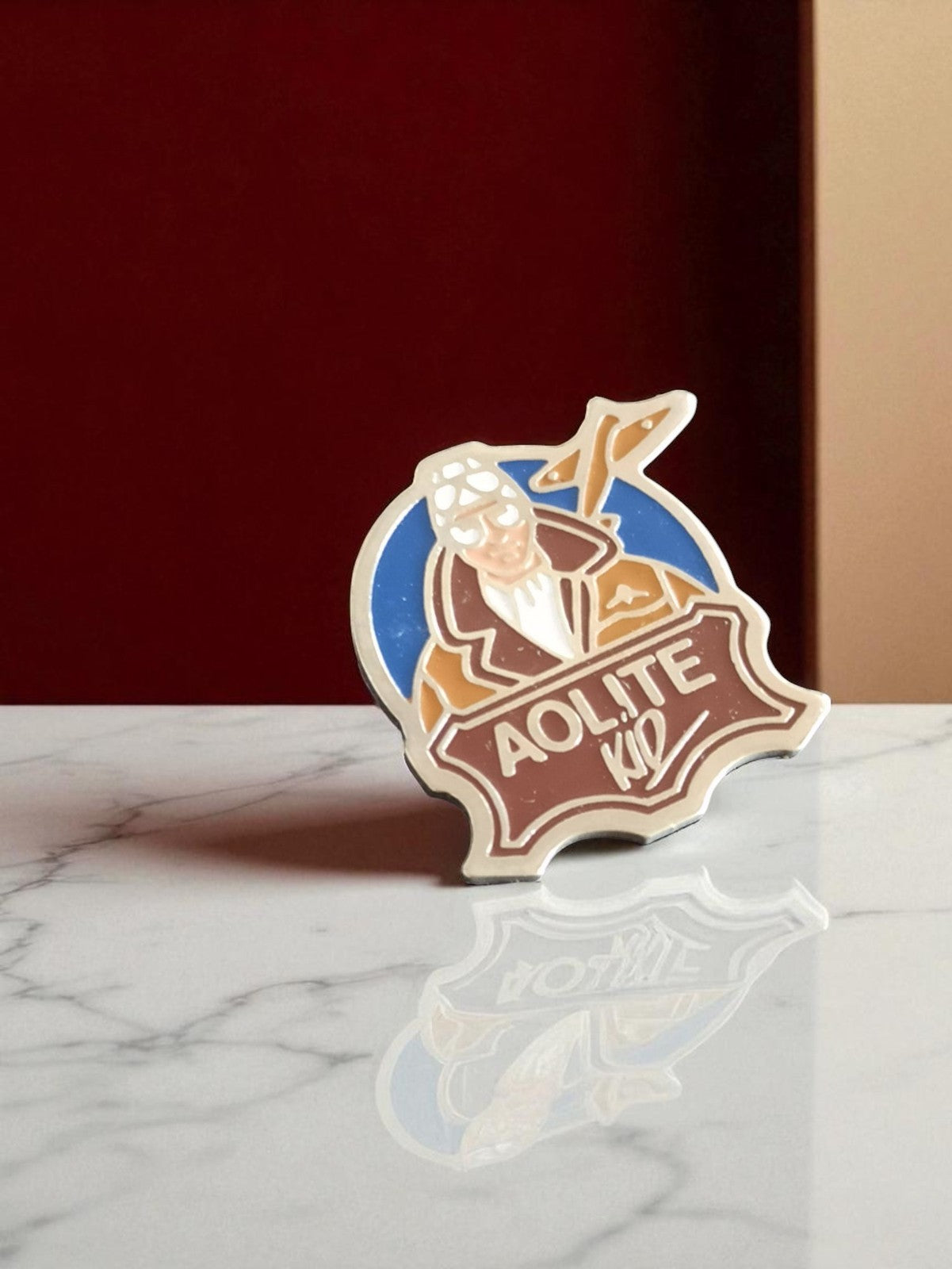 Pin's publicitaire vintage Aolite Kid édition limitée aviateur