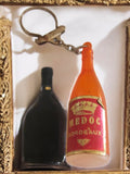 Porte-clés vintage bouteille Médoc Bordeaux publicitaire France ancien alcool