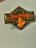 Pin's vintage JouéClub La Passion du Jouet, émaillé, personnage cartoon