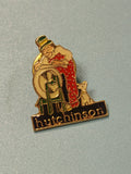 Pin's vintage Hutchinson émaillé personnage et chien, collection publicitaire