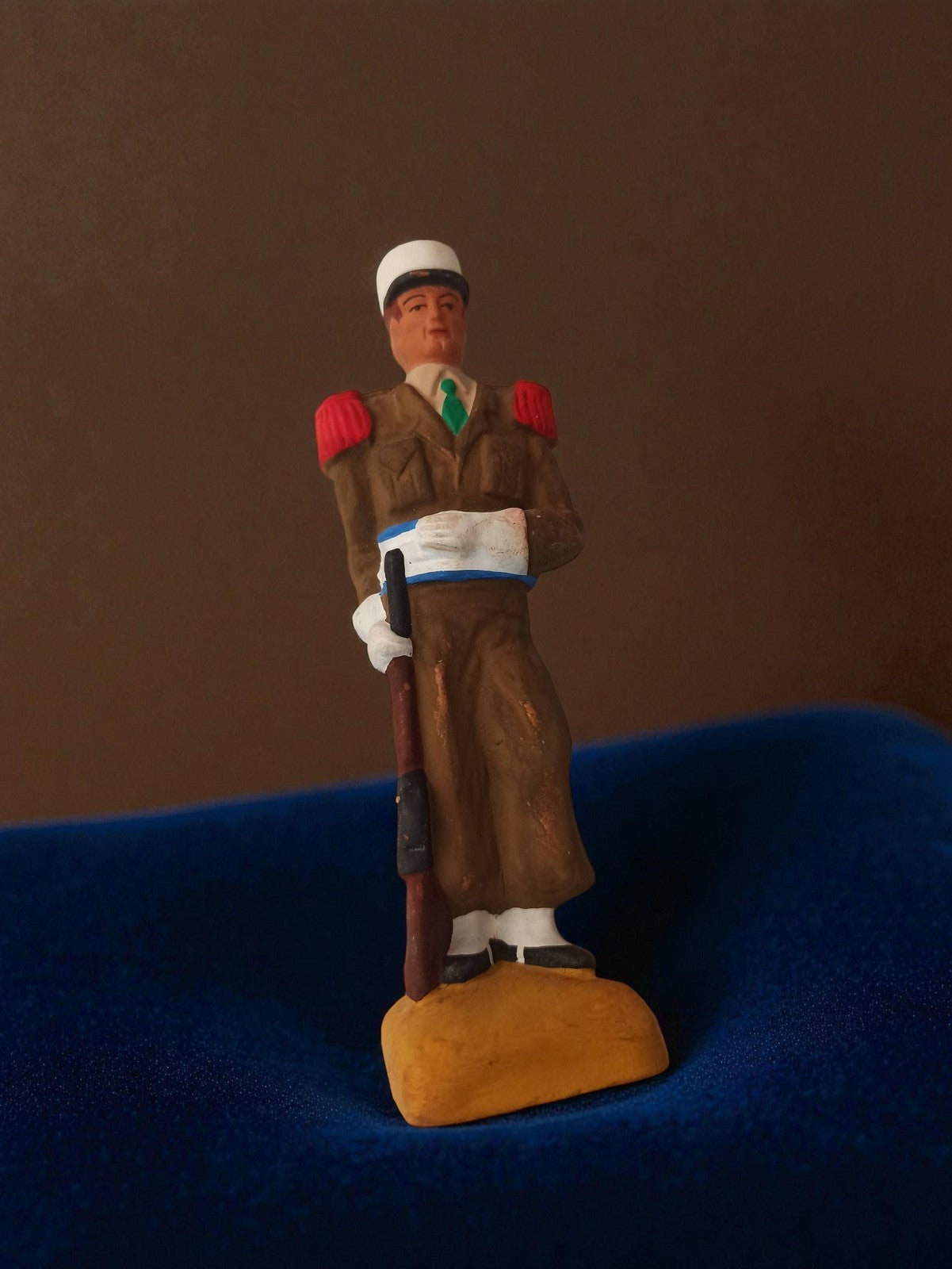 Ancient legionnaire figurine, vintage military statuette, khaki outfit, decor