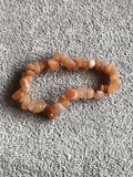 Bracelet pierres naturelles chips orange marron, élastique, perles irrégulières