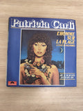 Vinyle 45 tours Patricia Carli L?homme sur la plage / Je n?aurais jamais dû Poly