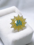 Pin's vintage Olympique de Marseille OM soleil logo bleu rétro supporter ancien
