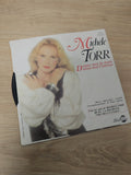 Old retro 45 rpm vinyl by Michèle Torr, vintage record collectible song