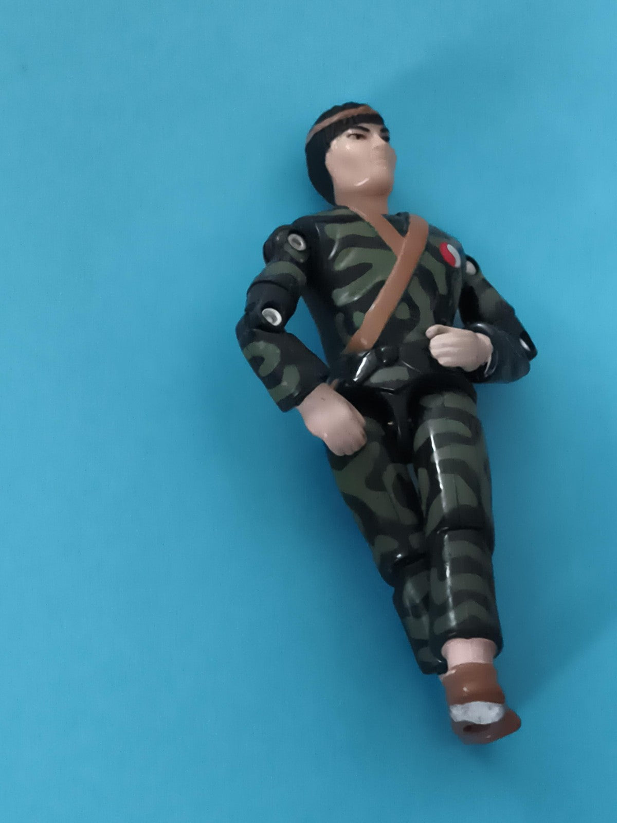 Figurine articulée militaire camouflage Gi Joe tenue verte bandeau