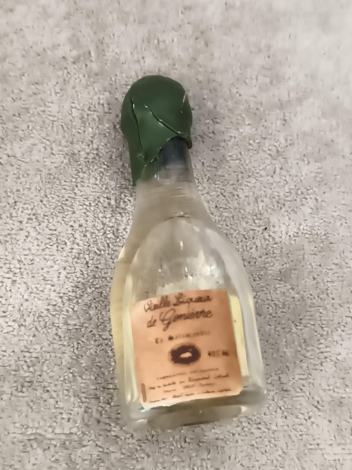 Miniature bouteille Vieille Liqueur de Genièvre étiquette d’origine partiellemen
