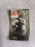 CPA Heureuse Année scène couple timbre rouge France début XXe
