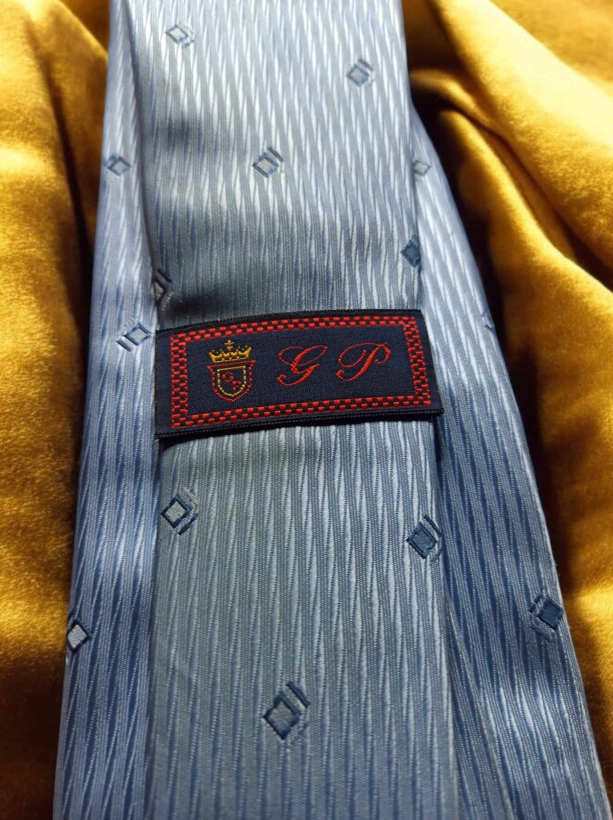 Cravate vintage soie bleu motif géométrique homme élégante rétro