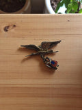 Broche cigogne métal argenté vintage figurine alsacienne émaillée