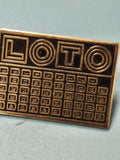 Pin's vintage Loto ancien, plaque émaillée noire et dorée, jeu de hasard