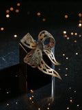 Broche ancienne nœud ajouré doré style Art déco vintage 1920 accessoire