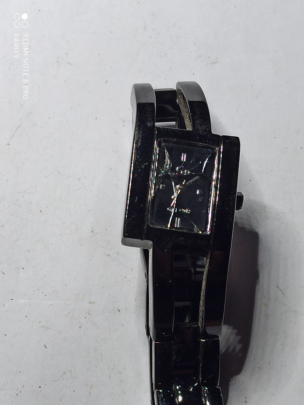 Montre vintage Go noire numérotée, bracelet large, à réparer, pour pièces