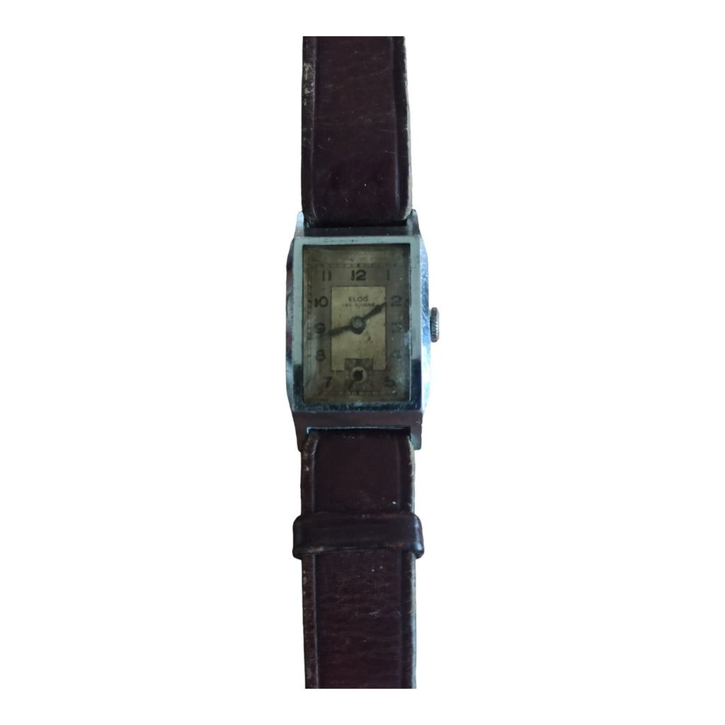 Montre rectangulaire vintage Elog Suisse mécanique cadran patiné, bracelet brun