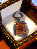 Porte-clés publicitaire vintage OLIVAR métal Huileries Varoises rétro ancien