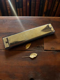 Harmonica vintage ancien finition dorée rétro instrument de musique