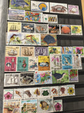 Lot de timbres Singapour multithèmes animaux fleurs véhicules usagés