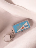 Porte-clés publicitaire vintage Lindt Gianduja ancien bleu rétro accessoire rare