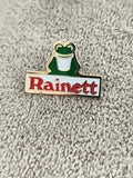 Pin's publicitaire vintage Rainett grenouille émaillée logo ancien badge (Ref 2)