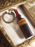 Porte-clés bouteille Raphaël vintage France publicité alcool