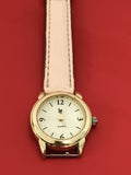 Montre Lip quartz femme dorée cadran blanc bracelet rose vintage à pile