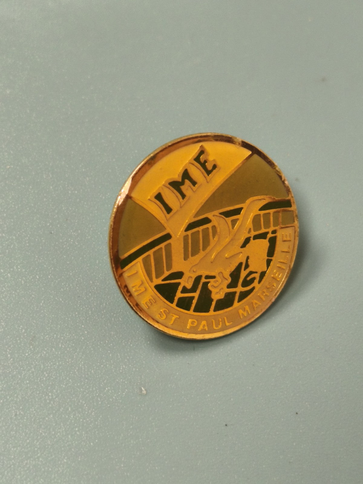 Pin's vintage IME St Paul Marseille rond doré collection badge ancien