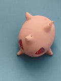 Figurine marionnette doigt Pokémon Goinfrex rose yeux rouges finger puppet