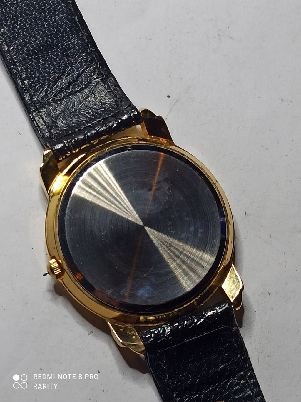 Montre homme Bauchard quartz, cadran blanc doré, bracelet noir, pile à changer