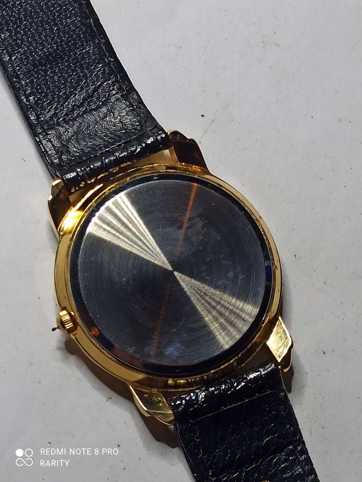 Montre homme Bauchard quartz, cadran blanc doré, bracelet noir, pile à changer
