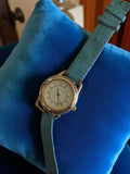 Montre femme Lancôme vintage cadran doré bracelet cuir bleu rétro élégant