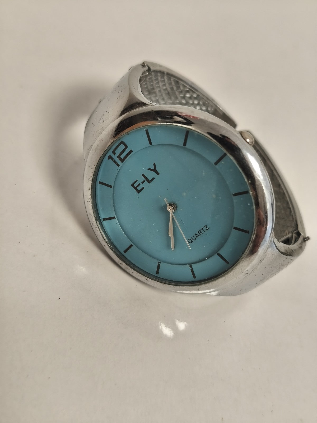 Montre vintage E-LY quartz cadran bleu, bracelet métal, non testée état