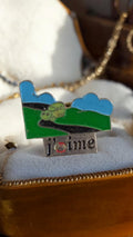 Pin's vintage Shell "J'aime la route" émaillé rétro voiture verte rare