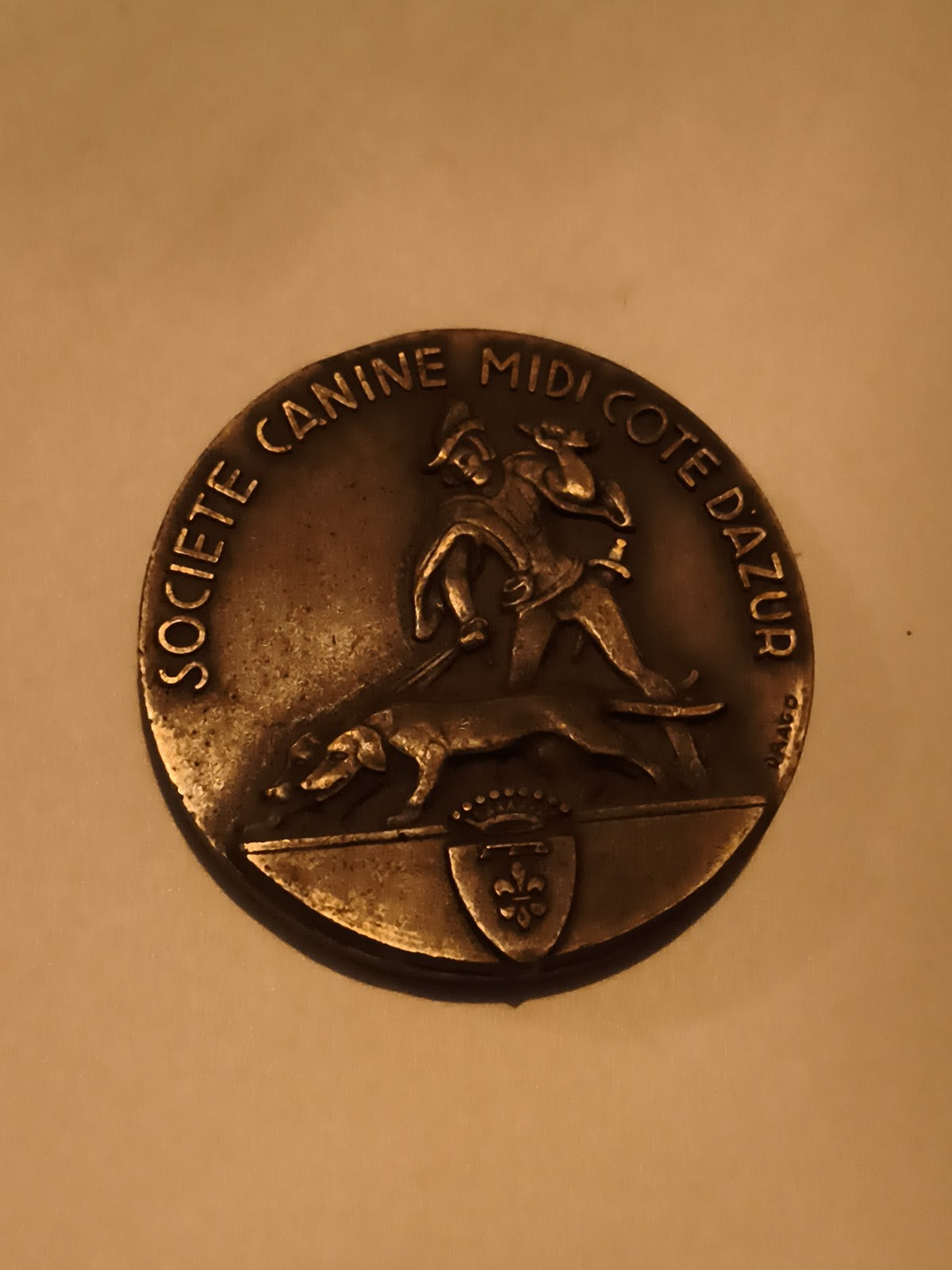 Médaille SOCIETE CANINE MIDI COTE D’AZUR bronze aspect patiné chien