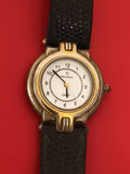 Montre ancienne Peugeot quartz publicitaire, cadran blanc, bracelet noir vintage