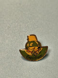 Pin's vintage Superfluor vert jaune personnage casque cyclisme ancien rare