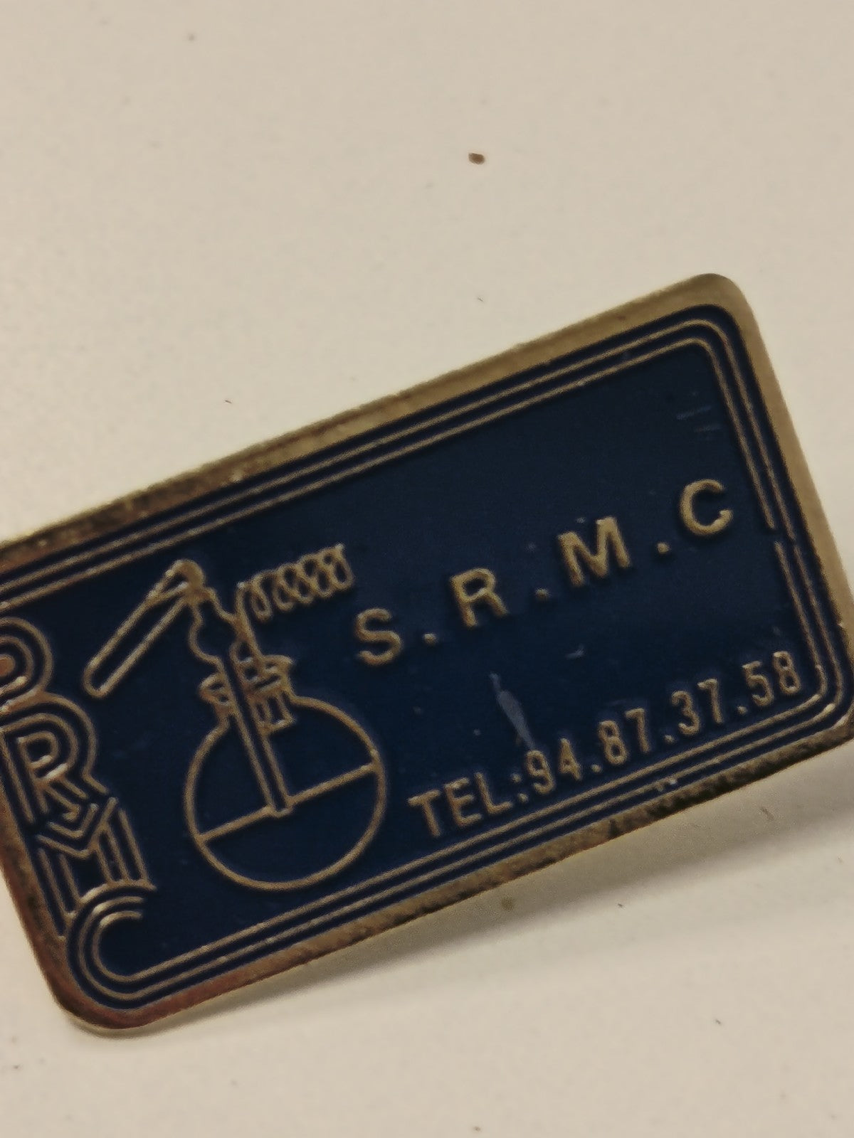 Pin's ancien SRMC vintage, badge rétro collection, objet publicitaire rare
