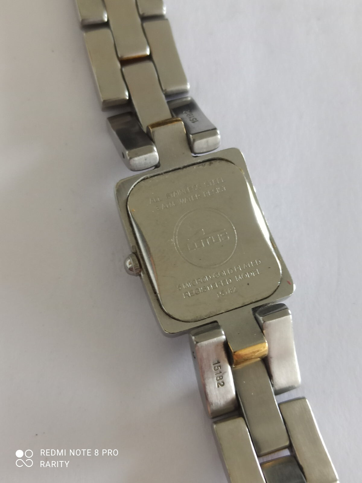 Montre femme Lotus quartz vintage, bracelet bicolore, cadran carré élégant