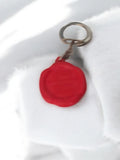 Porte-clés publicitaire ancien vintage, médaillon rouge rétro, objet d’occasion