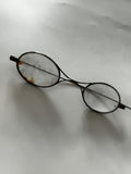 Lunettes anciennes monture ovale métal patinée début XXe vintage rétro