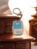 Porte-clés publicitaire Chocolat Poulain vintage rétro bleu blanc