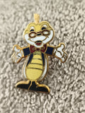 Pin's vintage mascotte dessin animé émail jaune bleu costume (Ref 1)